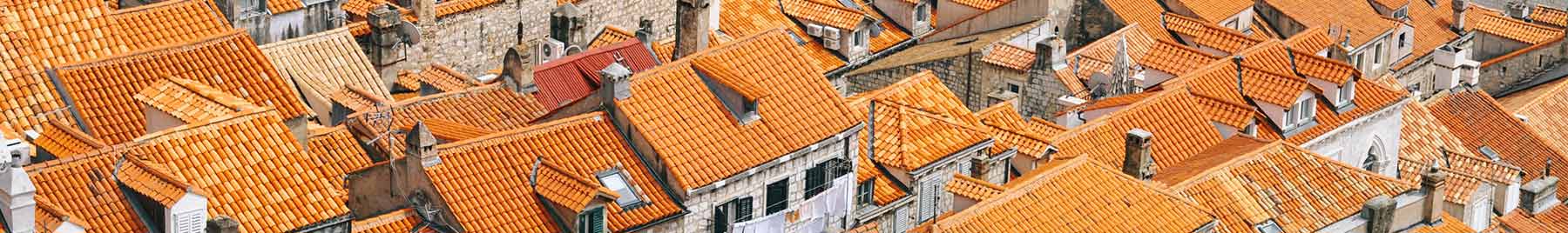 an overhead view of orange tiled roofs