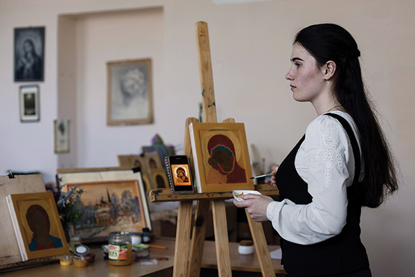 A theological seminary student in the icon-painting workshop