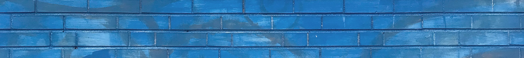 blue painted brick wall