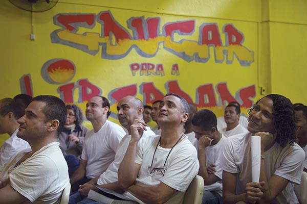 Prisoners at a men’s penitentiary in Rio de Janeiro, Brazil, watch a performance by the author.