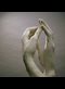 sculpture of two hands touching