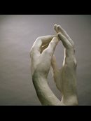 sculpture of two hands touching