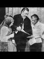 Eberhard Arnold and colleagues looking over a manuscript for typesetting