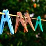 Colorful clothespins on a clothesline