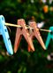 Colorful clothespins on a clothesline