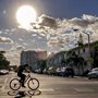 a man riding a bicycle on a deserted street