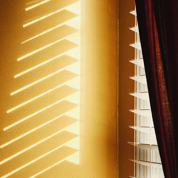 morning light shining through window blinds
