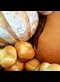 different types of bread on a blue checked cloth