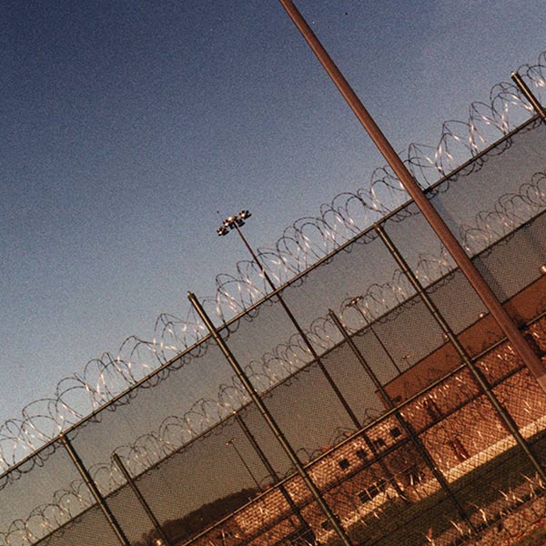 a fence outside a prison