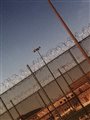 a fence outside a prison