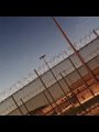 a fence outside a prison