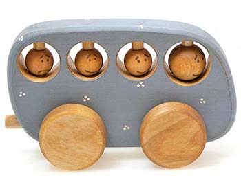 Small wooden toy bus with wooden people inside.