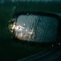 rain soaked rearview mirror
