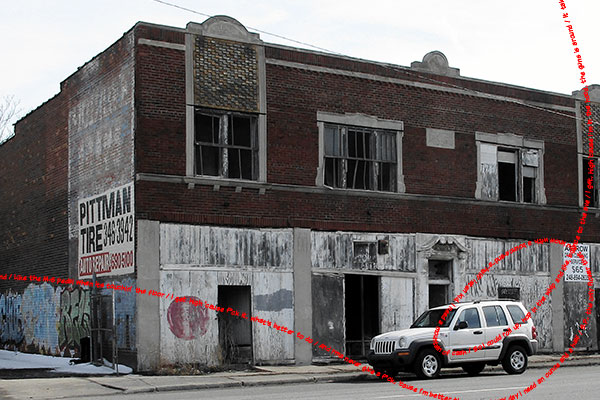 photo of an old store with red text of a rap song overlaid