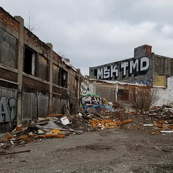 photo of a rubble filled alley