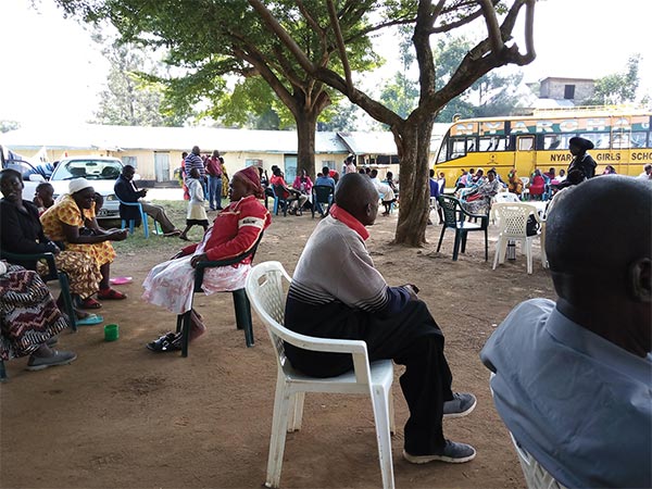 Attendees take a break between sessions at a church ­conference in Kenya.