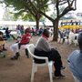people sitting on chairs outdoors