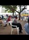 people sitting on chairs outdoors