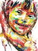 painting of smiling boy with Down Syndrome in abstract bright colors