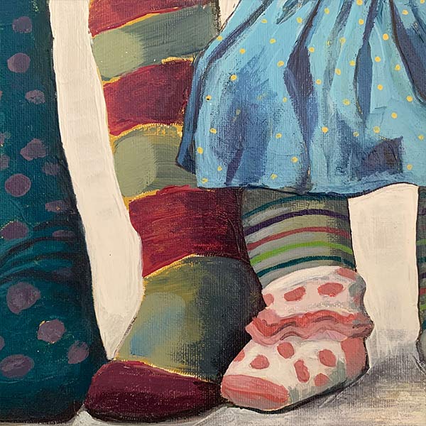 painting of childrens feet wearing mismatched socks