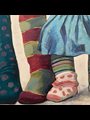 painting of childrens feet wearing mismatched socks