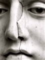 cracked face of a marble statue