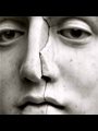 cracked face of a marble statue