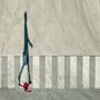 overhead view of a young woman in red on a crosswalk