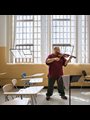 man playing viola