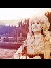photo of the Smoky Mountains overlaid with a picture of Dolly Parton