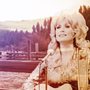photo of the Smoky Mountains overlaid with a picture of Dolly Parton