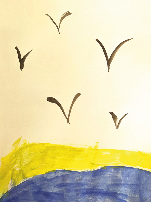 artwork of birds over the colors of the Ukrainian flag, made by a refugee child