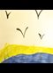 artwork of birds over the colors of the Ukrainian flag, made by a refugee child
