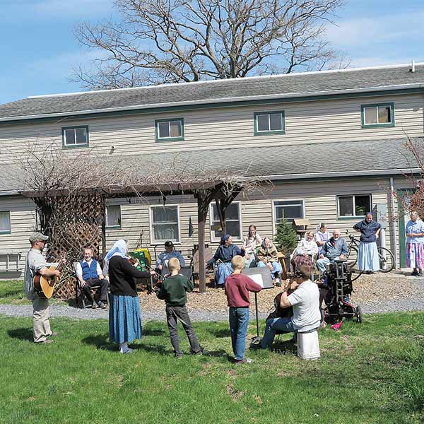 a family of musicians serenades elderly people during the 2020 Covid Lockdown