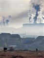 factory smokestacks with grey smog