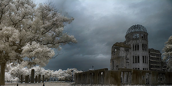 photograph of trees blooming outside the damaged church in Hiroshima where the nuclear bomb detonated in 1945