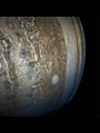tan and blue swirls and patterns in the clouds of Jupiters atmosphere