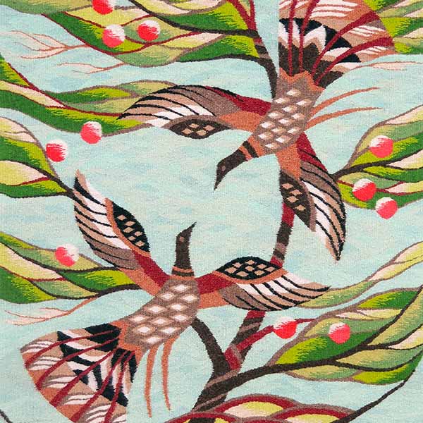tapestry art of two birds in an apple tree