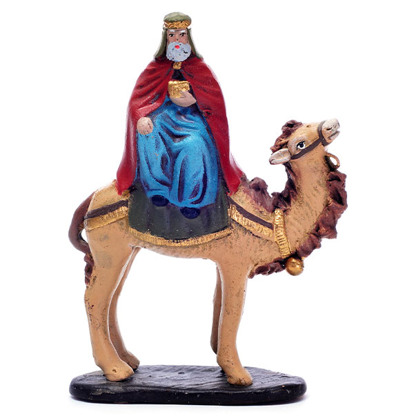 painted carving of a king on a camel