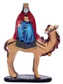 painted carving of a king on a camel