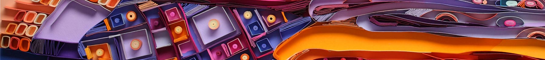 paper artwork of an old woman selling stacks of brightly colored cloth