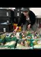 a woman sorting groceries into crates