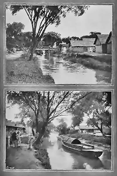 old photograph of houseboats on a river