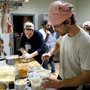 people making pizza