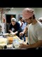 people making pizza