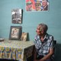 an old man sitting at a table