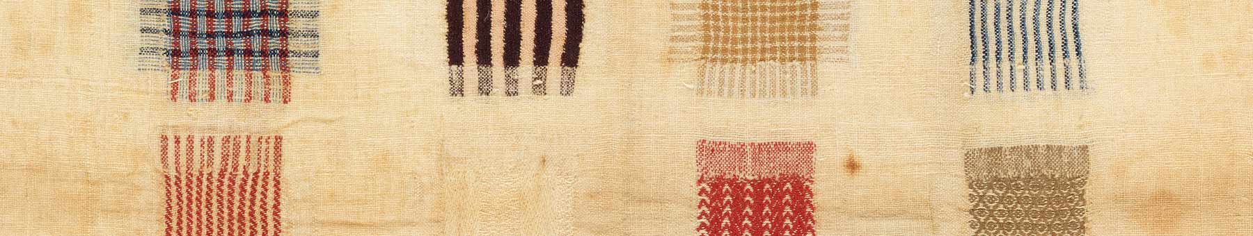patches of cloth on a sampler