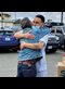 a prisoner embracing his father minutes after his release