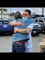 a prisoner embracing his father minutes after his release