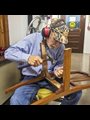 a man fixing a chair